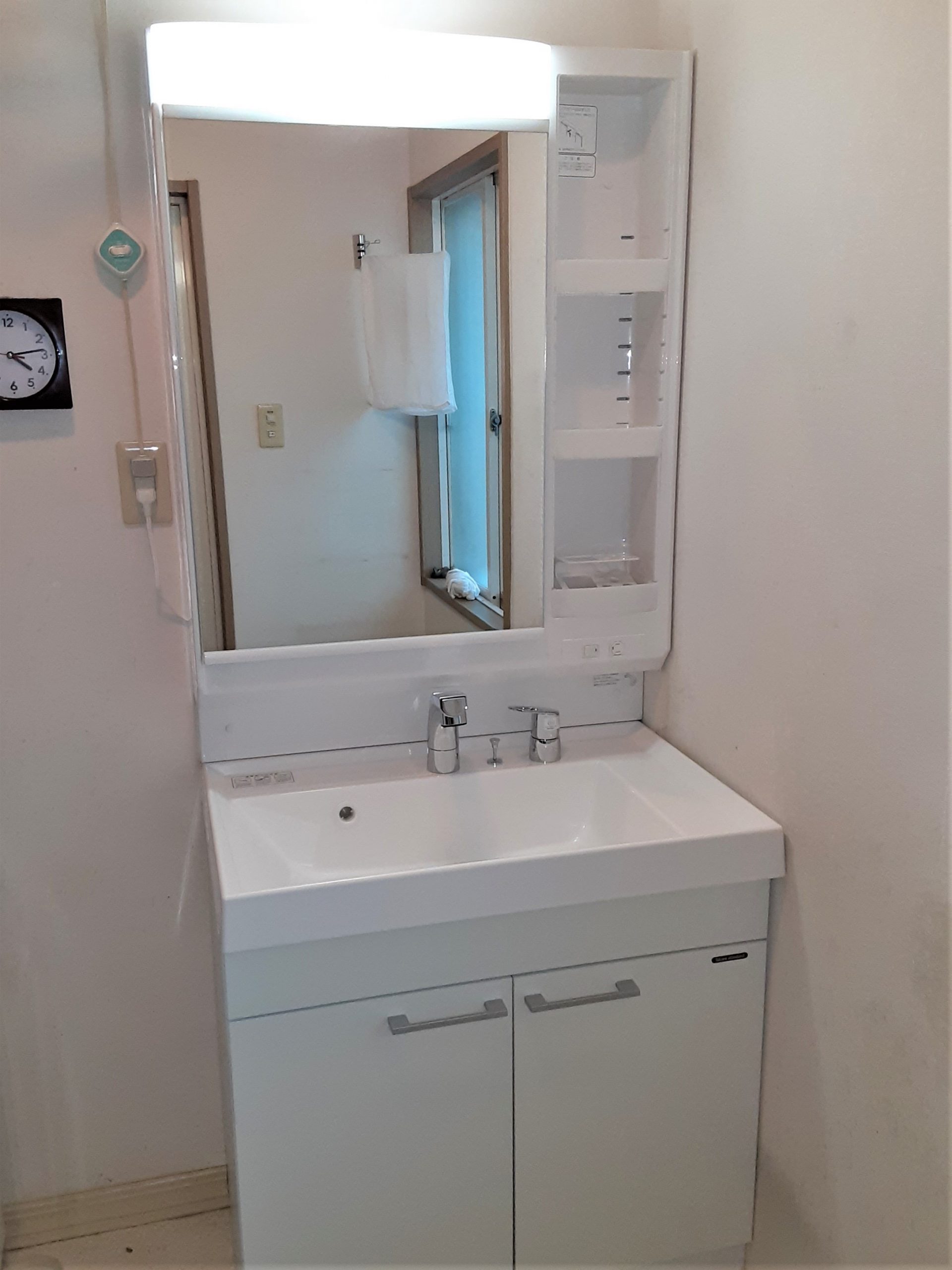 洗面化粧台を取替えて　明るく使いやすい水まわりに